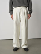 ROYA Pleated Acetate Wool Trousers in White - On Model