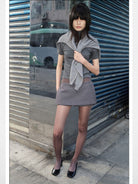 RARELY ALIKE Open Back Wool Mock Neck Top in Gray - On Model