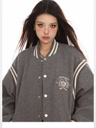 BIGGOLD STUDIO Retro Stand Collar Varsity Jacket in Gray - On Model #color_gray