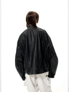 UNKNOWNWORLD Structured Cowhide Biker Jacket in Black - On Model
