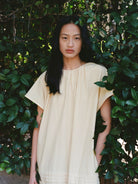 RandomPiece Eco Cotton Hemp Tiered Maxi Dress in Cream - On Model