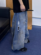 Triangle Project Distressed Dirty Dye Patchwork Jeans in Denim - On Female Model