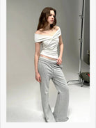 PUKI Twisted Knot Off Shoulder Top in White - On Model