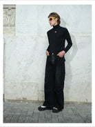 TRIANGLE PROJECT Logo High Neck Long Sleeve Top in Black - On Model