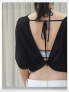 RARELY ALIKE Tie Back Lyocell Batwing Top in Black - On Model