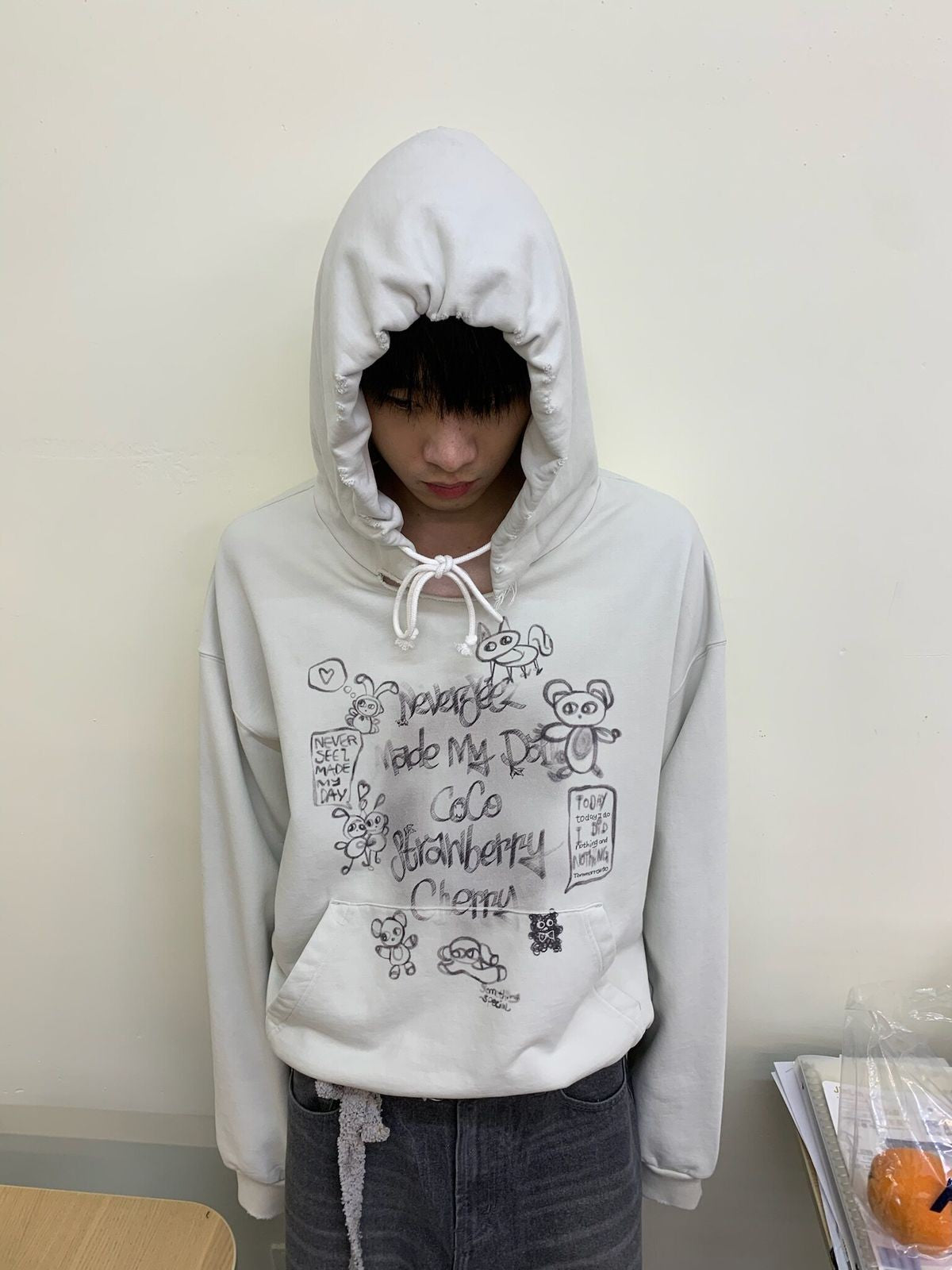 NeverSeez Mist Spray Paint Distressed Hoodie in Gray - On Male Model