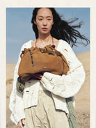 Songmont Suede Baina Hobo Bag in Brown - On Model