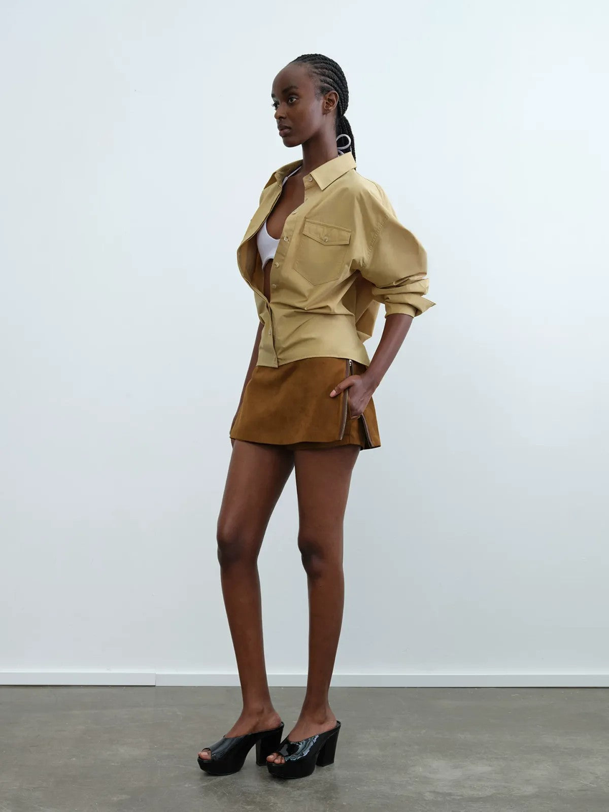 RARELY ALIKE Side Zip Faux Leather Skort in Brown - On Model