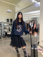 NeverSeez Layered Graphic Patch Hoodie in Navy - On Female Model