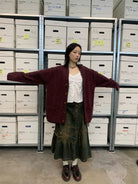 NeverSeez Asymmetric Vintage Wash Denim Skirt in Dark Wash - On Model