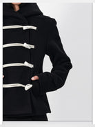 RARELY ALIKE Short Lambswool Duffle Coat in Black - On Model