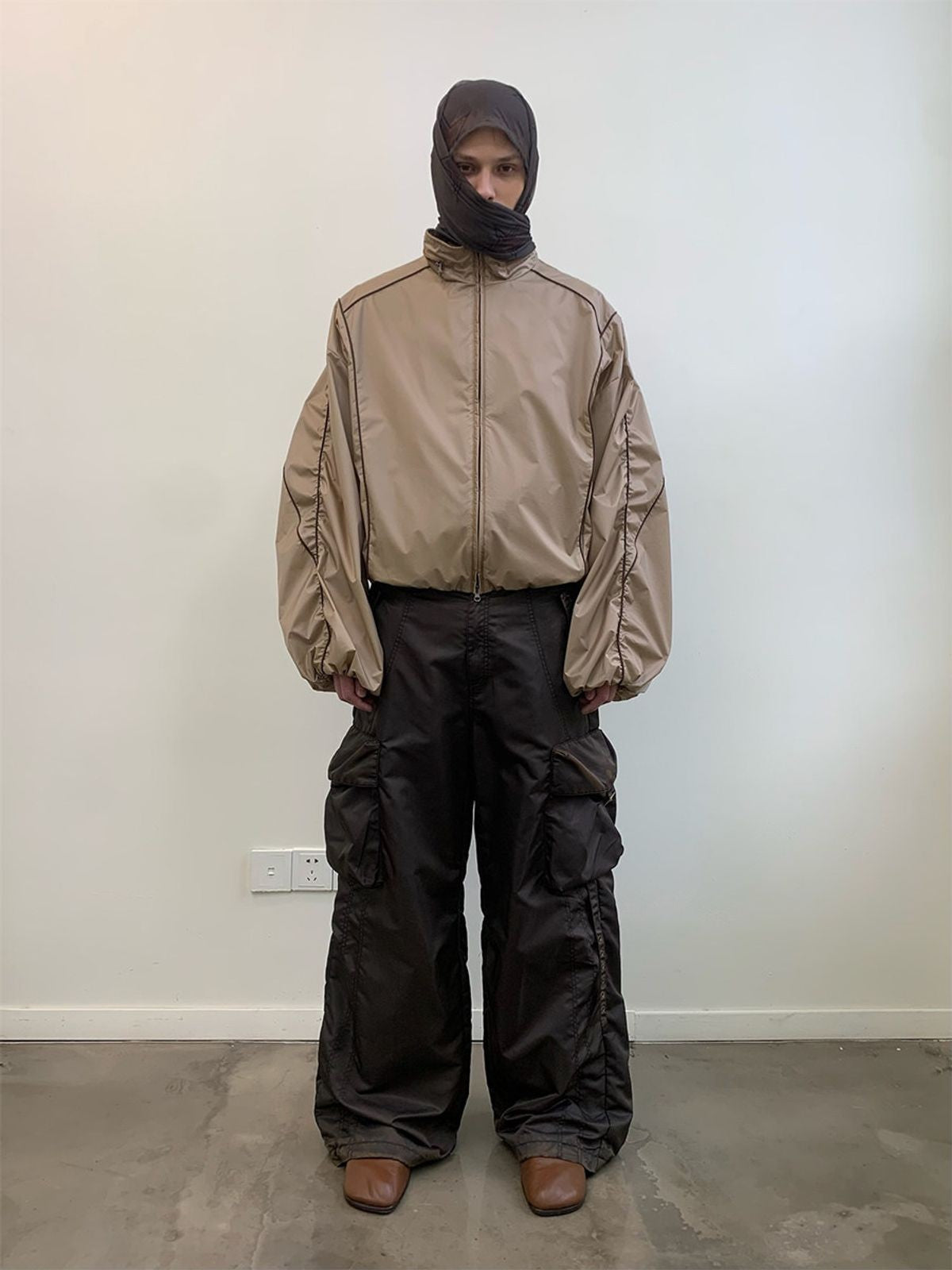 NeverSeez Spliced Wide Leg Cargo Pants in Brown - On Male Model