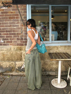 ACSENSE STUDIO Dirty Wash Curved Wide Leg Jeans in Blue - On Model