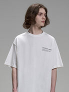 LOSTCTRL Heavyweight Graphic Print T Shirt in White - On Male Model