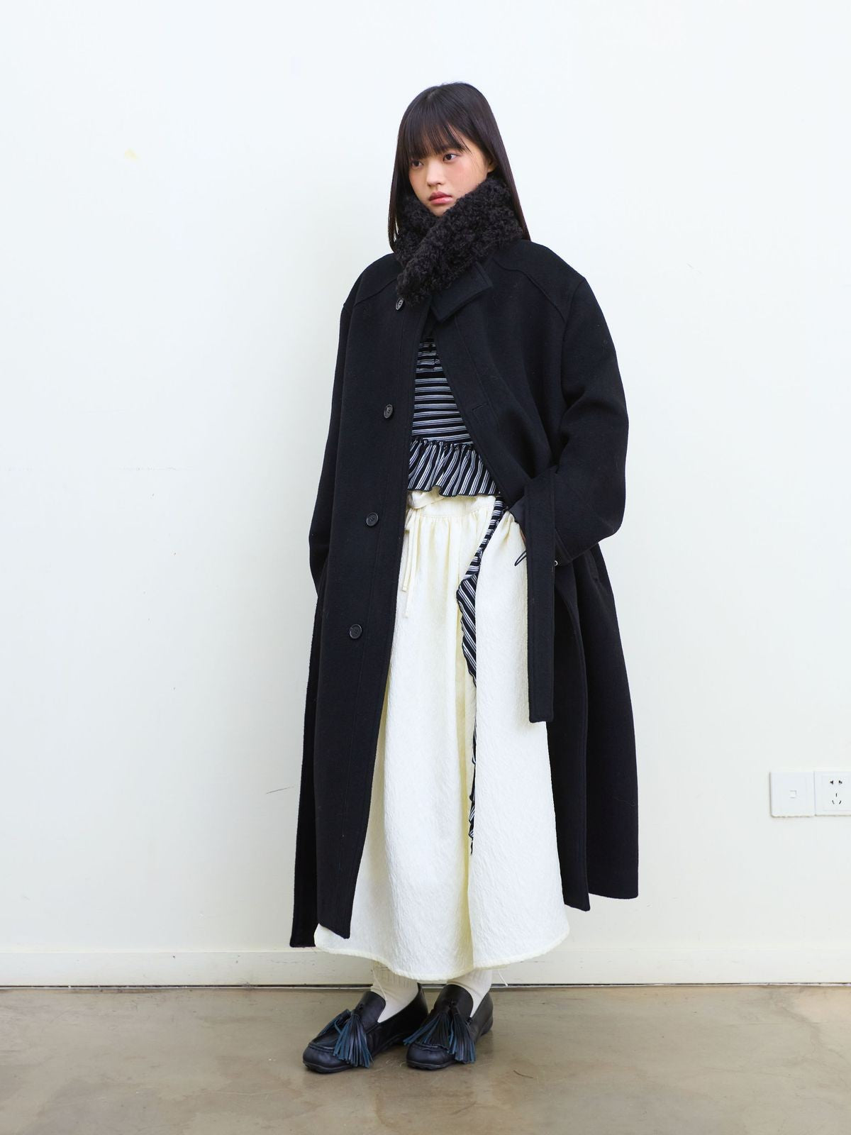 NeverSeez Asymmetric Raw Edge Wool Coat in Black - On Model