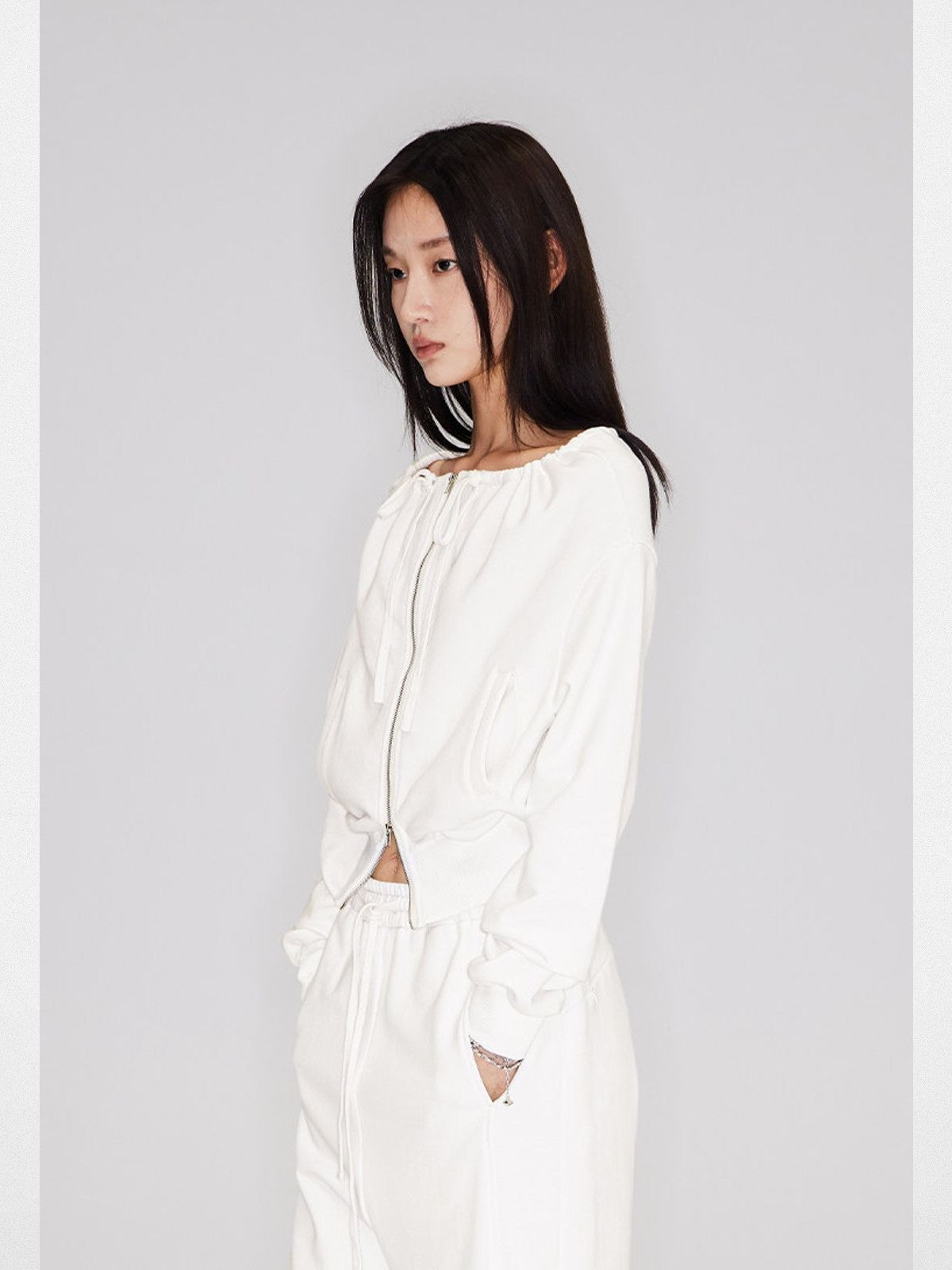 RARELY ALIKE Two Way Off Shoulder Zip Hoodie in White - On Model