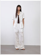 RandomPiece Hollow Out Embroidered Pants in White - On Model