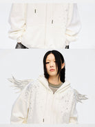 CFIERCE Rhinestone Angel Wing Zip Hoodie in White - On Female Model