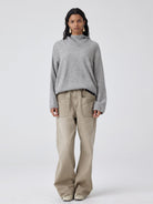 Simple Project Pom Pom Detail Hoodie in Gray - On Female Model