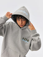 MEDM Embroidered Logo Fleece Hoodie in Gray - On Model