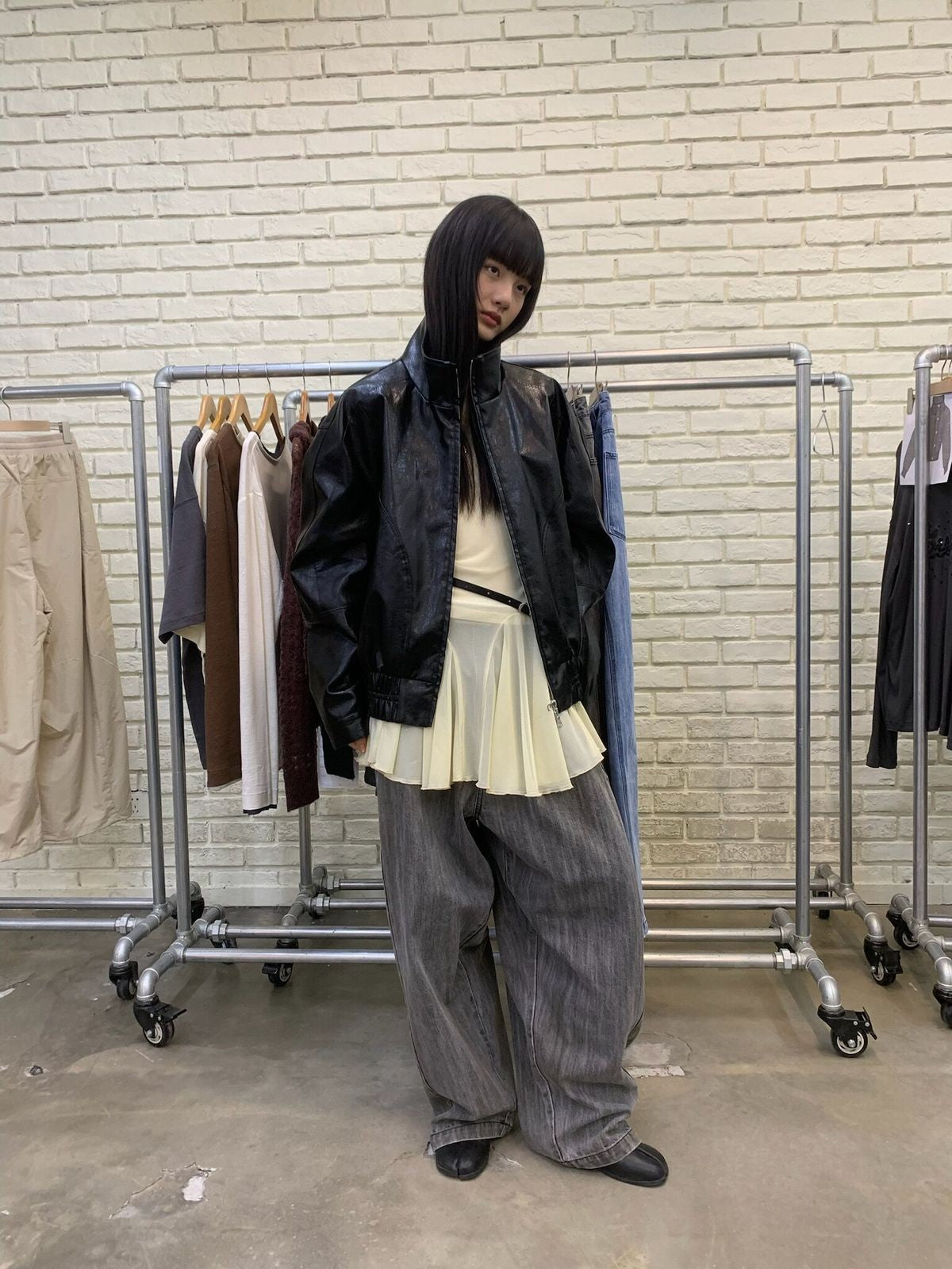 NeverSeez Curved Leg Dirty Wash Jeans in Black - On Model