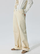 Simple Project Cuffed Corduroy Boot Cut Trousers in White - On Model