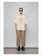 NANS 300g Cotton Graphic T Shirt in White - On Model