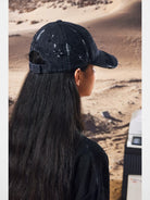 UNKNOWNWORLD Distressed Paint Splatter Cap in Black - On Model