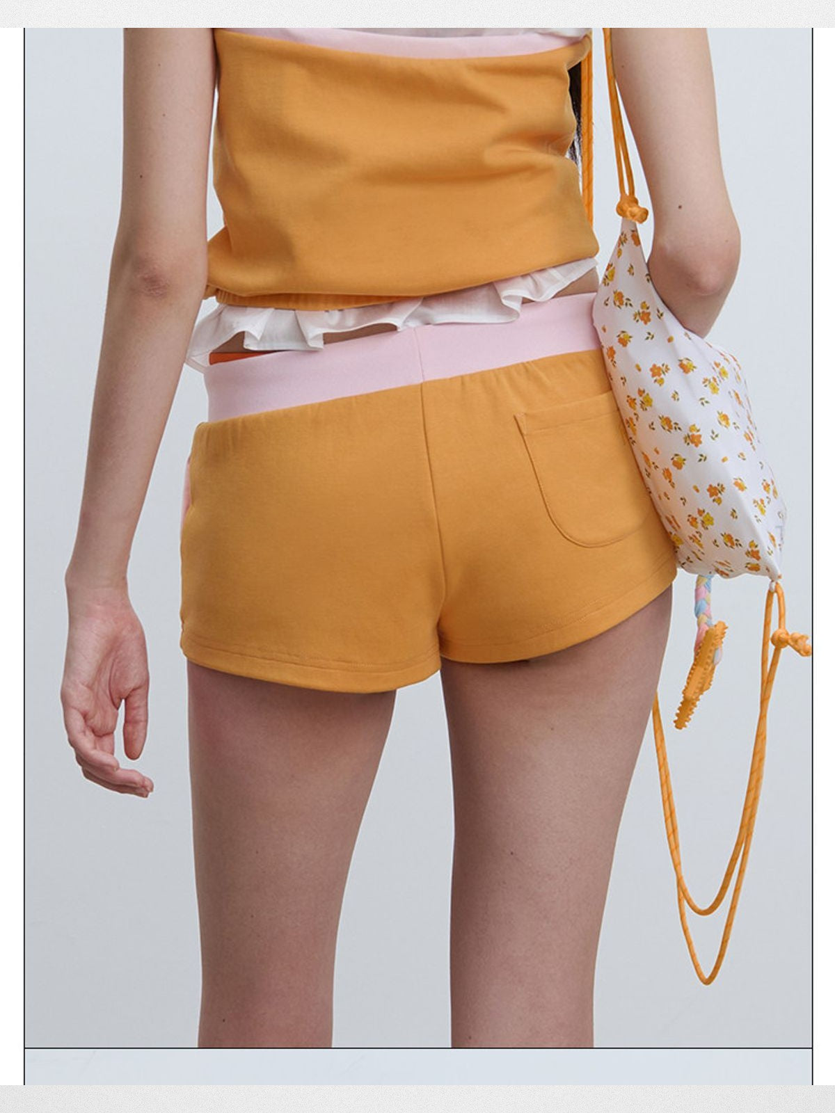 RARELY ALIKE Color Block Sweat Shorts in Orange - On Model