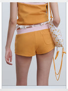 RARELY ALIKE Color Block Sweat Shorts in Orange - On Model