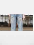 BLINDNOPLAN Distressed Ink Splatter Flare Jeans in Blue - On Model