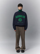 NANS Heavyweight Cotton Varsity Sweatshirt in Navy Blue - On Model