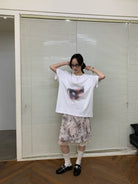 NeverSeez Hazy Puppy Print Cotton T Shirt in White - On Female Model