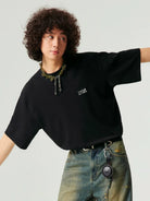 Simple Project Inverted Logo High Crew Tee in Black - On Male Model