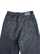 UNKNOWNWORLD Distressed Boro Mud Dyed Jeans in Black