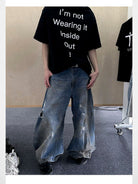 Triangle Project Distressed Dirty Dye Patchwork Jeans in Denim - On Male Model