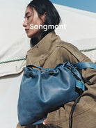 Songmont Slouchy Nappa Leather Tote in Navy Blue - On Model