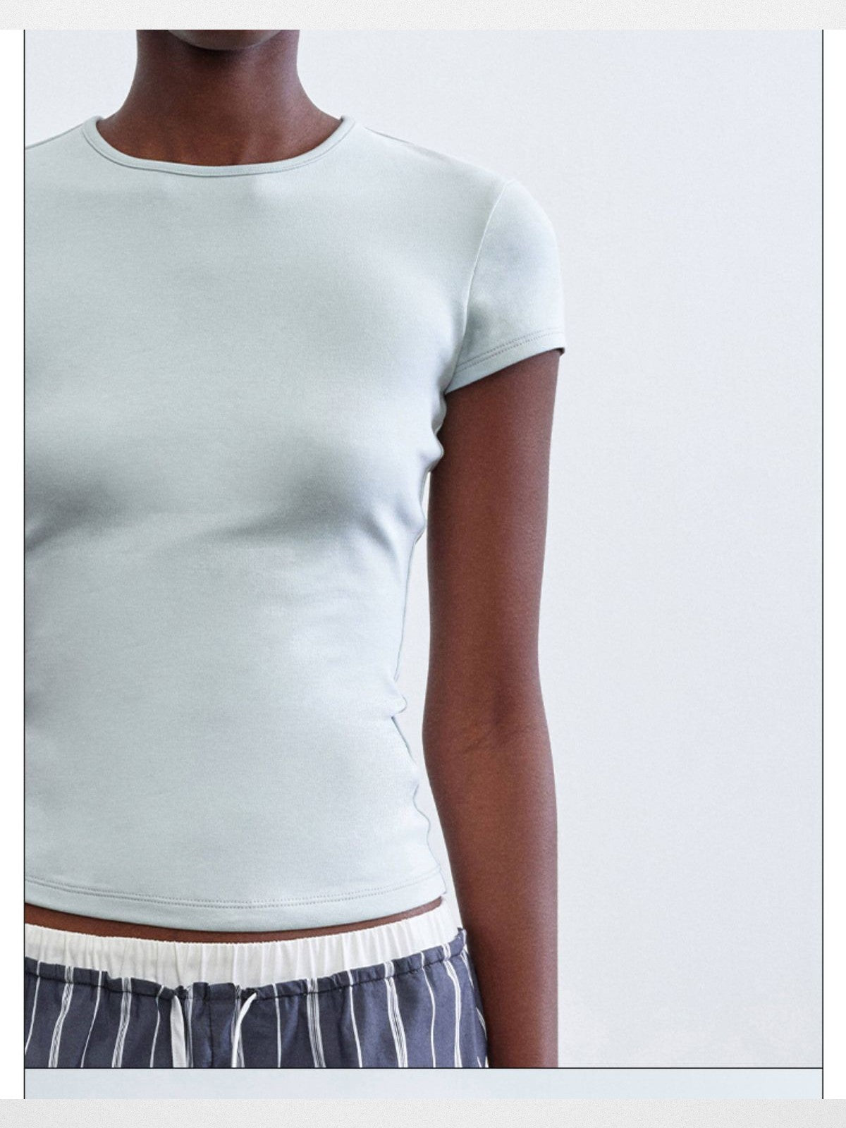 RARELY ALIKE Hourglass Cotton Crew Neck Tee in Sky Blue - On Model