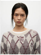 RandomPiece Distressed Argyle Alpaca Blend Sweater in Beige - On Model
