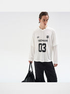 BLINDNOPLAN Striped Jersey V Neck T Shirt in White - On Model