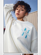 MEDM Cotton Blend Logo Crewneck in White - On Female Model