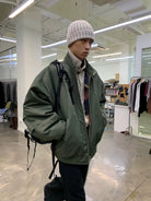 NeverSeez 3M Thinsulate Padded Bomber Jacket in Green - On Male Model