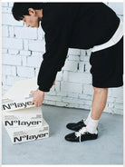 NANS Oversized Pima Cotton Sweatshirt in Black - On Male Model