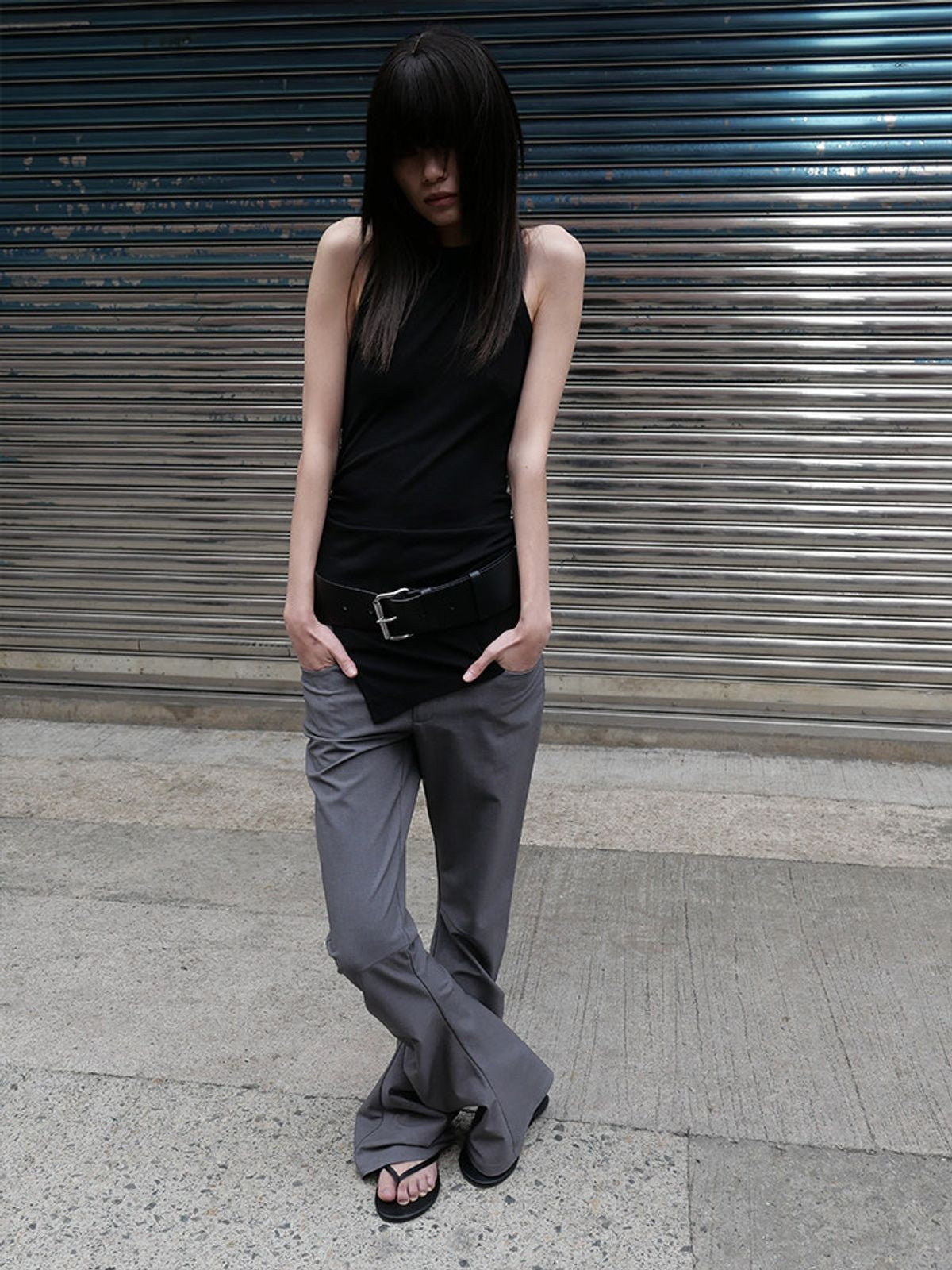 RARELY ALIKE Curved Leg Flared Suit Pants in Gray - On Model