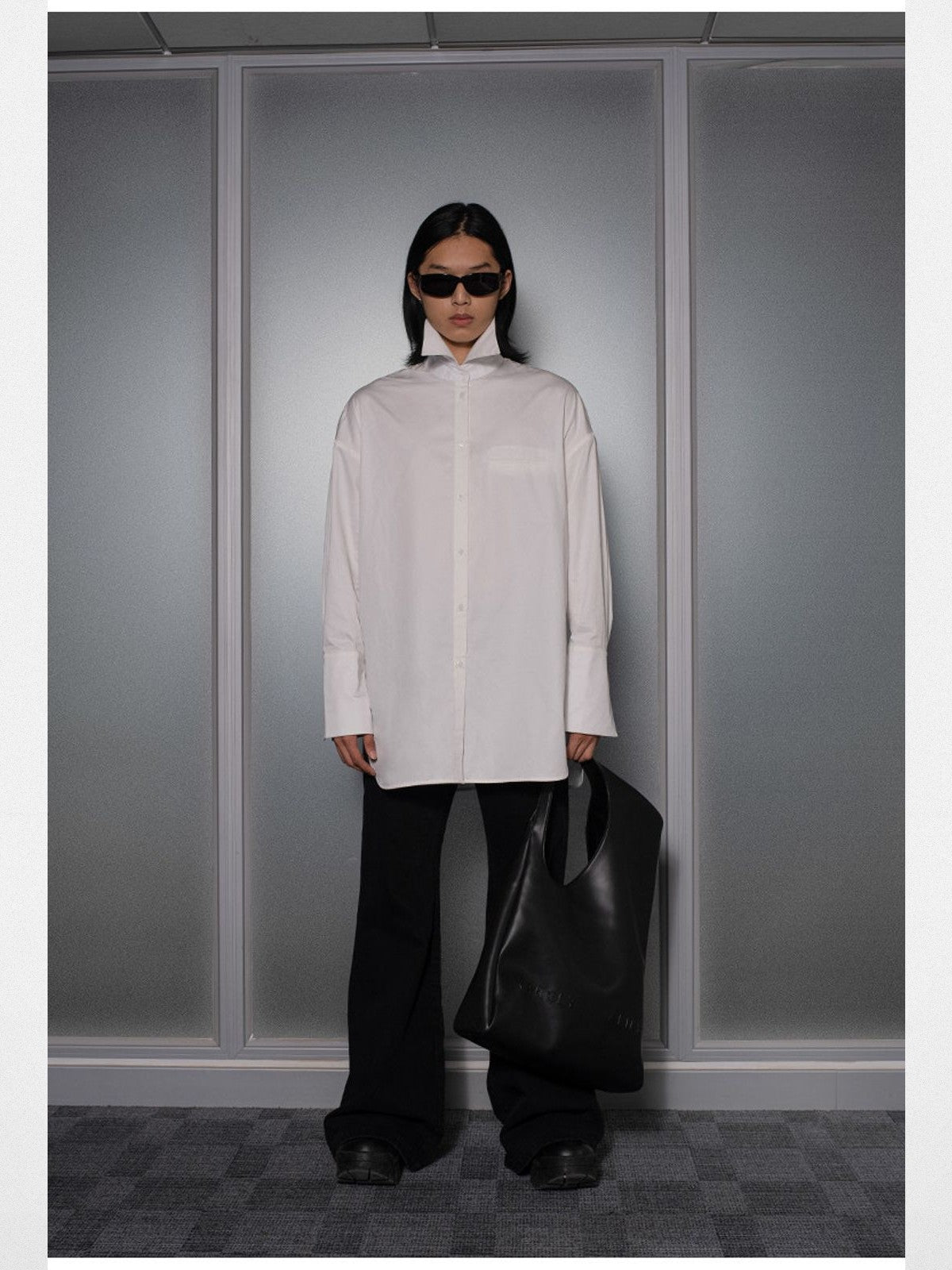 RARELY ALIKE Flared Cotton Denim Jeans in Black - On Model