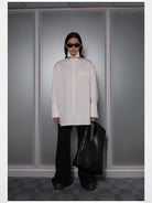 RARELY ALIKE Flared Cotton Denim Jeans in Black - On Model