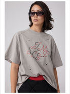 Simple Project Studded Script Logo T Shirt in Beige - On Female Model