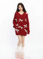 Bow Embellished Cold Shoulder Sweater in Red #pose_variant #color_red